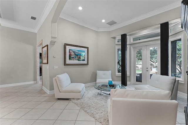 living room with french doors, light tile patterned floors, and ornamental molding