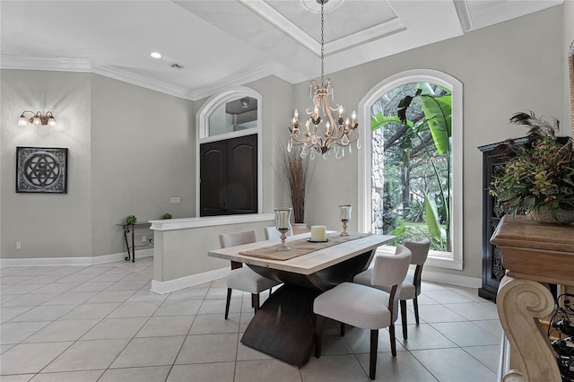 tiled dining space with a wealth of natural light, ornamental molding, and a notable chandelier