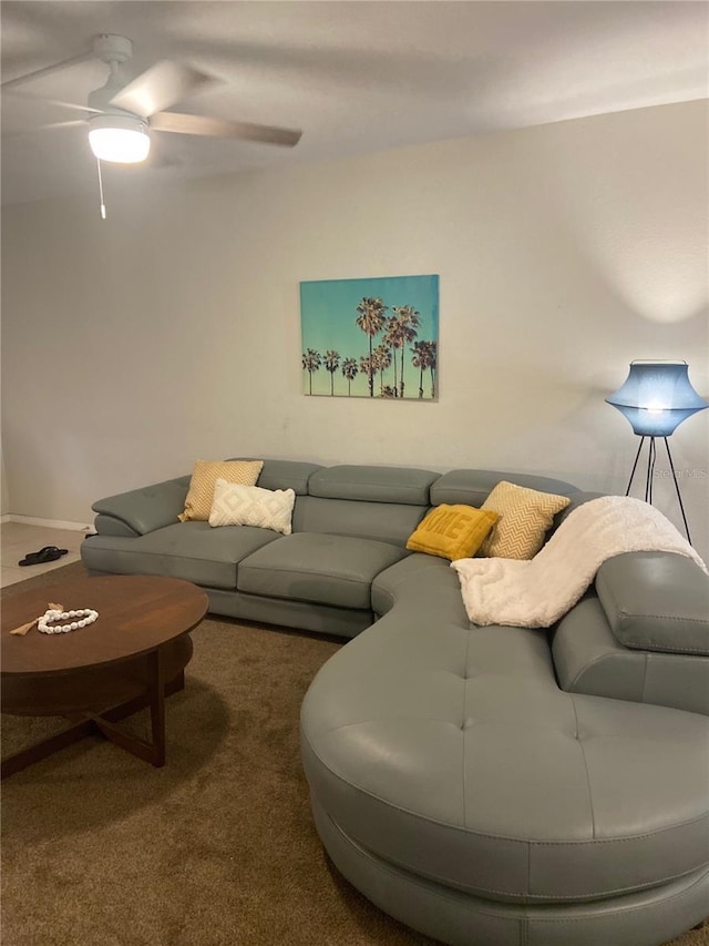 carpeted living room featuring ceiling fan