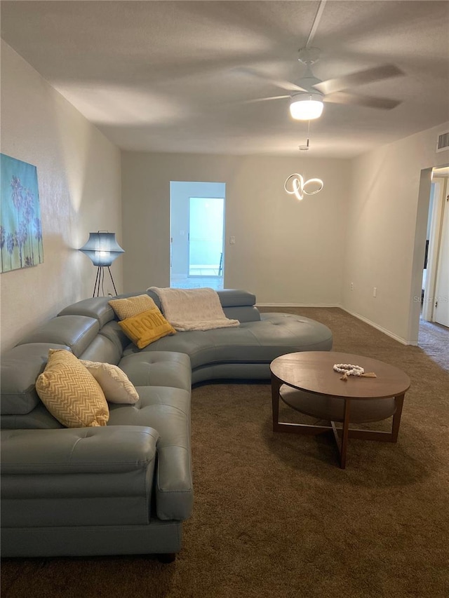 living room with carpet and ceiling fan