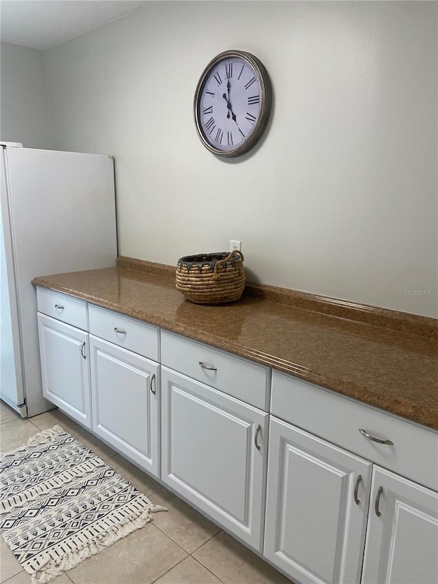 room details featuring white refrigerator