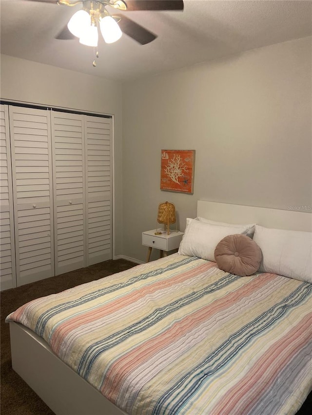 bedroom featuring carpet floors, a closet, and ceiling fan