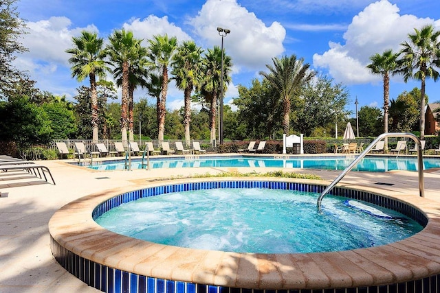 view of pool featuring a patio