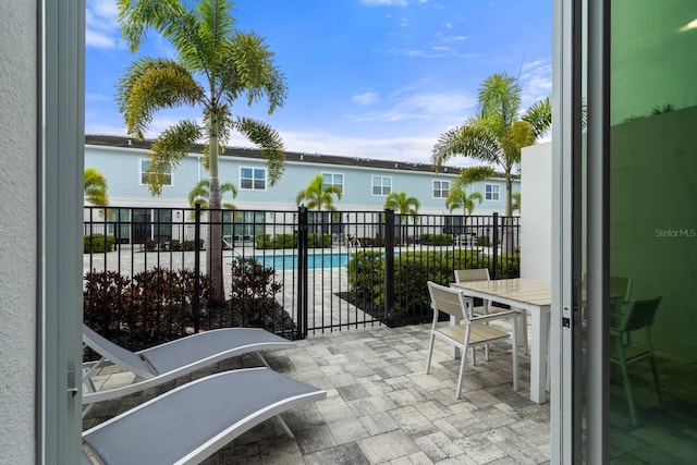 balcony featuring a patio area