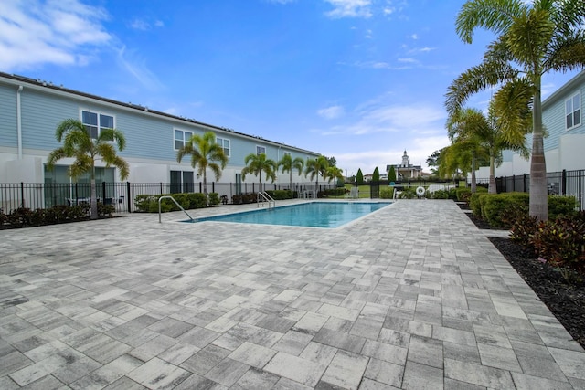 view of swimming pool featuring a patio