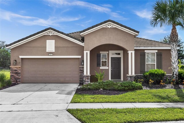 view of front of home with a garage