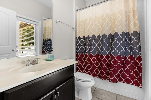 full bathroom featuring tile patterned flooring, vanity, shower / bath combo, and toilet