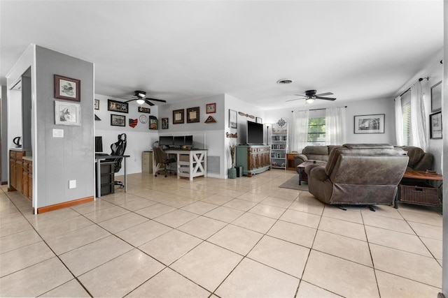 tiled living room featuring ceiling fan