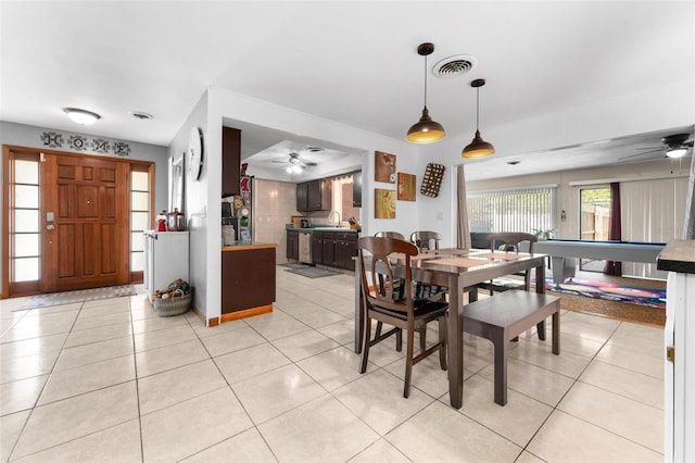 dining area with light tile patterned floors and pool table