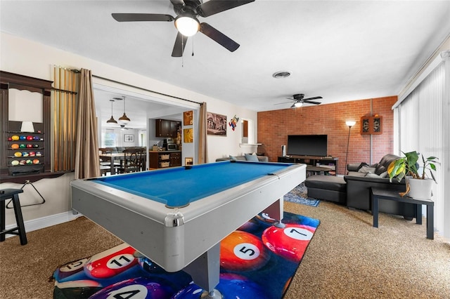 game room with ceiling fan, brick wall, and pool table