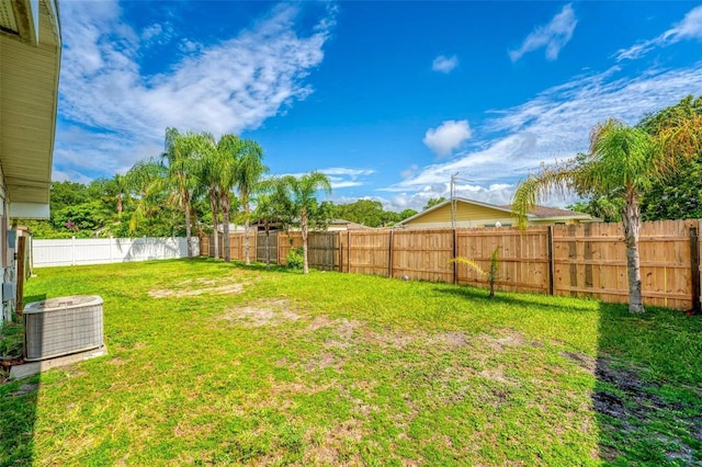 view of yard with central AC