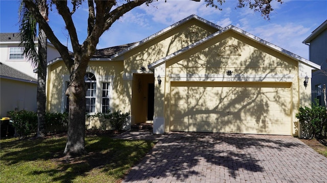 view of front of property featuring a garage