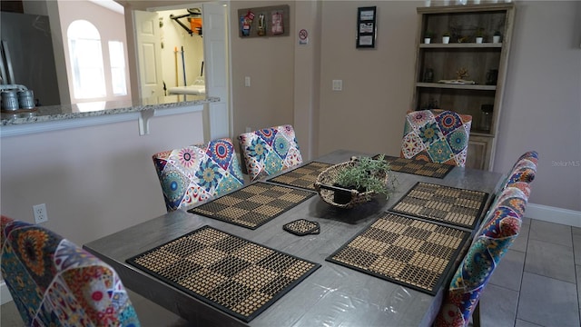 view of tiled dining space