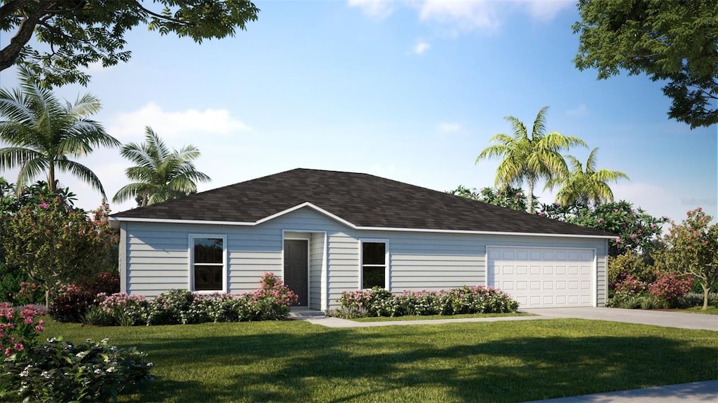 view of front of house featuring a garage and a front yard