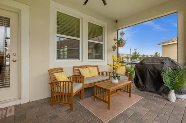 view of patio featuring a grill, ceiling fan, and an outdoor hangout area