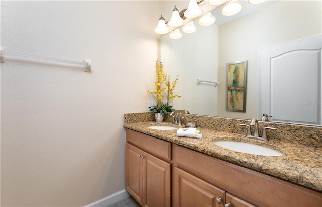 bathroom featuring double vanity and a sink