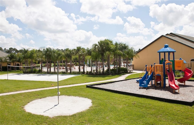 view of play area with volleyball court and a yard