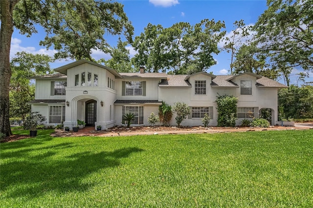 view of front of home featuring a front yard