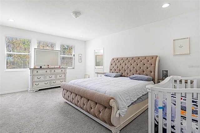 bedroom featuring carpet floors, recessed lighting, and baseboards