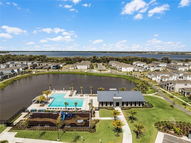 aerial view featuring a water view and a residential view