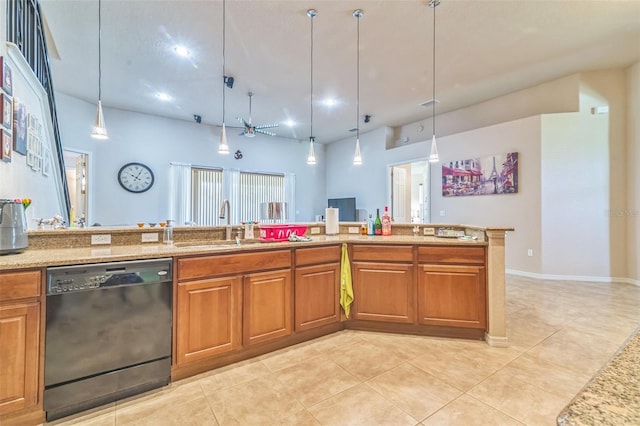 kitchen featuring light tile patterned flooring, hanging light fixtures, sink, dishwasher, and light stone countertops