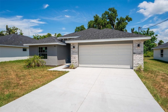 single story home with a garage and a front yard