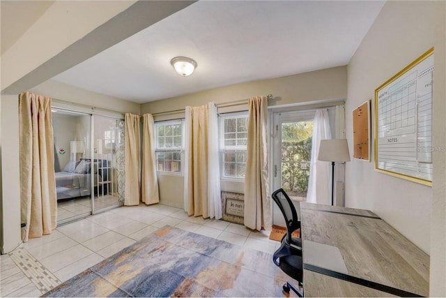 office area featuring light tile floors