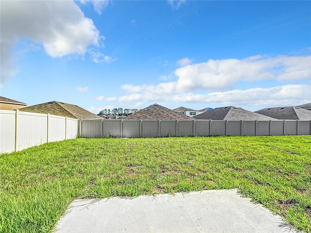 view of yard with fence