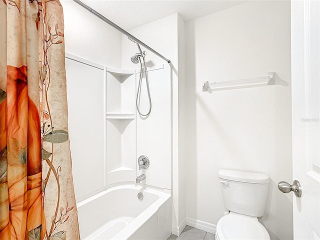 bathroom featuring toilet and shower / bath combo