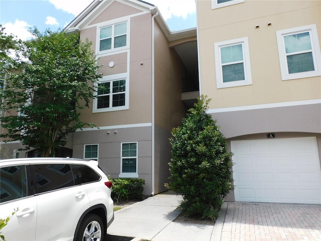 view of front of property with a garage