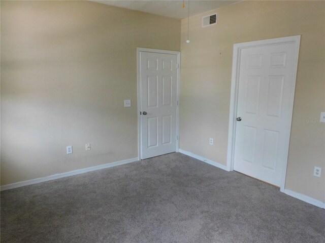 empty room featuring carpet