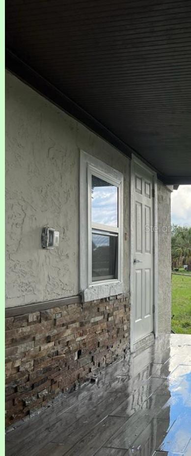 1526 Lakewood Rd, Davenport, FL 33837 - exterior view of stucco siding