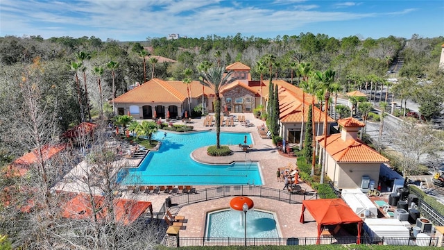 view of swimming pool featuring a patio area