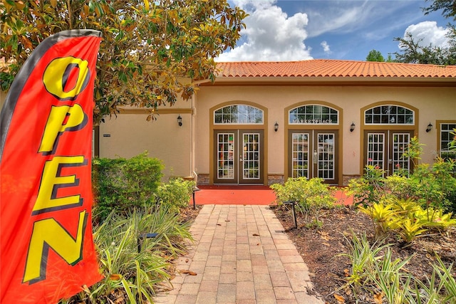 view of exterior entry with french doors