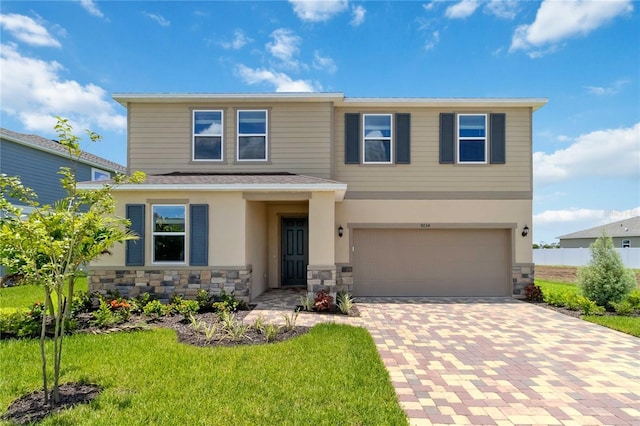 view of front of property with a garage