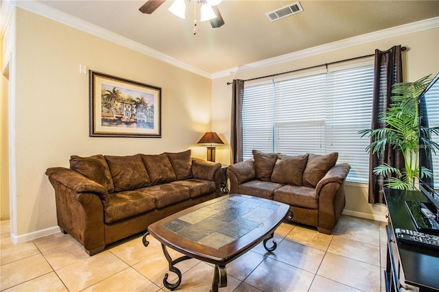 tiled living room featuring ornamental molding and ceiling fan