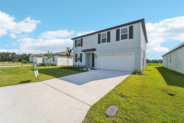 view of front of home featuring a garage and a front lawn