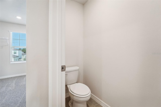 bathroom featuring toilet