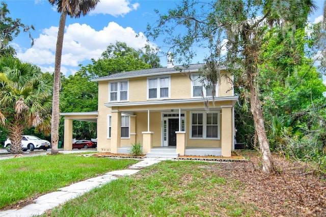 view of front facade with a front yard