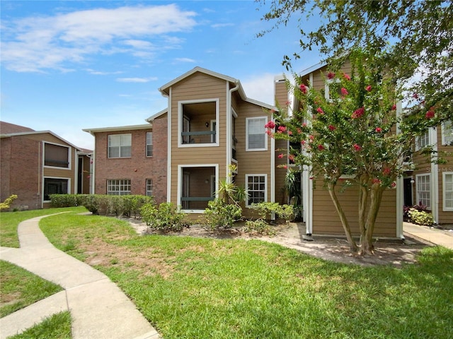 exterior space with a front yard