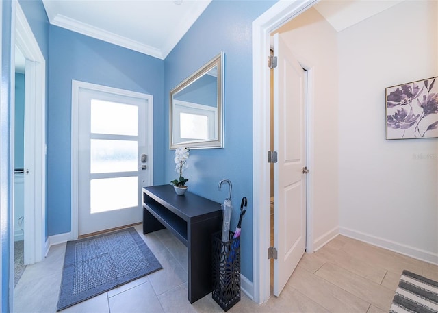 entryway featuring light tile patterned floors and ornamental molding