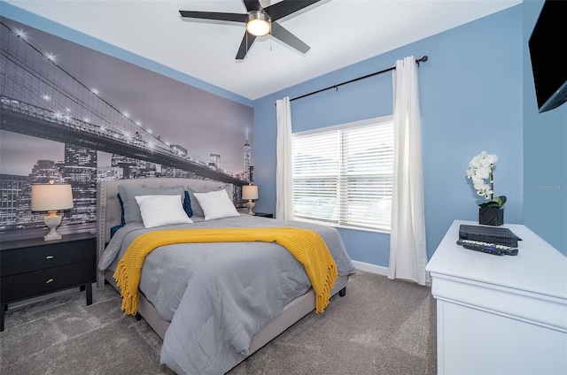 bedroom featuring ceiling fan and carpet floors