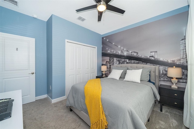 bedroom featuring carpet flooring, a closet, and ceiling fan