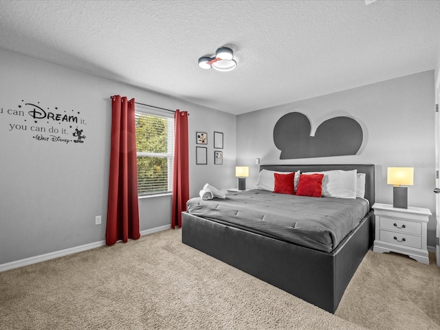 carpeted bedroom with a textured ceiling