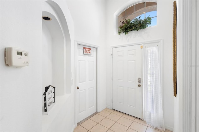 foyer featuring light tile flooring