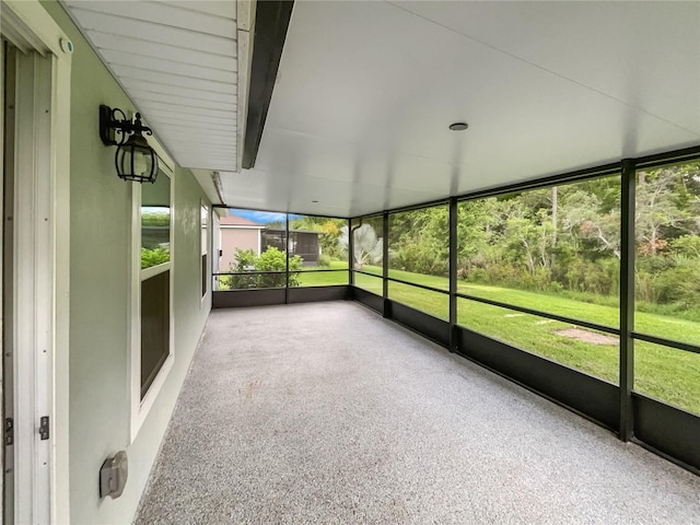 unfurnished sunroom featuring a healthy amount of sunlight