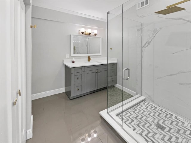 bathroom with vanity, tile patterned floors, walk in shower, and crown molding