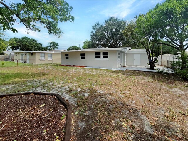 back of house featuring a patio area