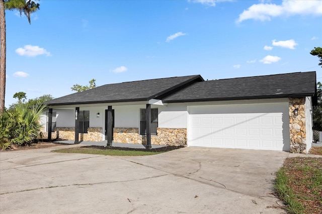 single story home with a garage