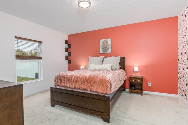 bedroom with light colored carpet